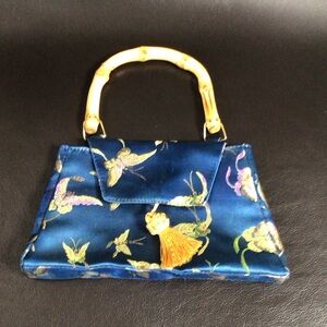 Lovely bamboo half moon handle satin purse
